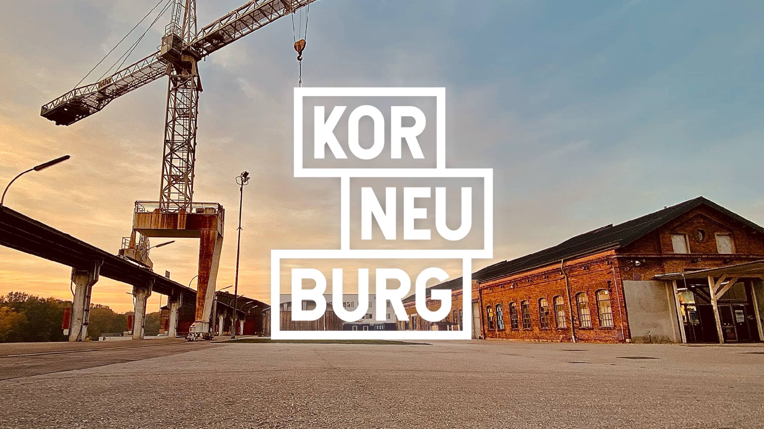 Markenauftritt der Stadt Korneuburg mit Industriekulisse und modernem Logo – starke visuelle Identität für den Wandel in einem urbanen Zukunftsraum.