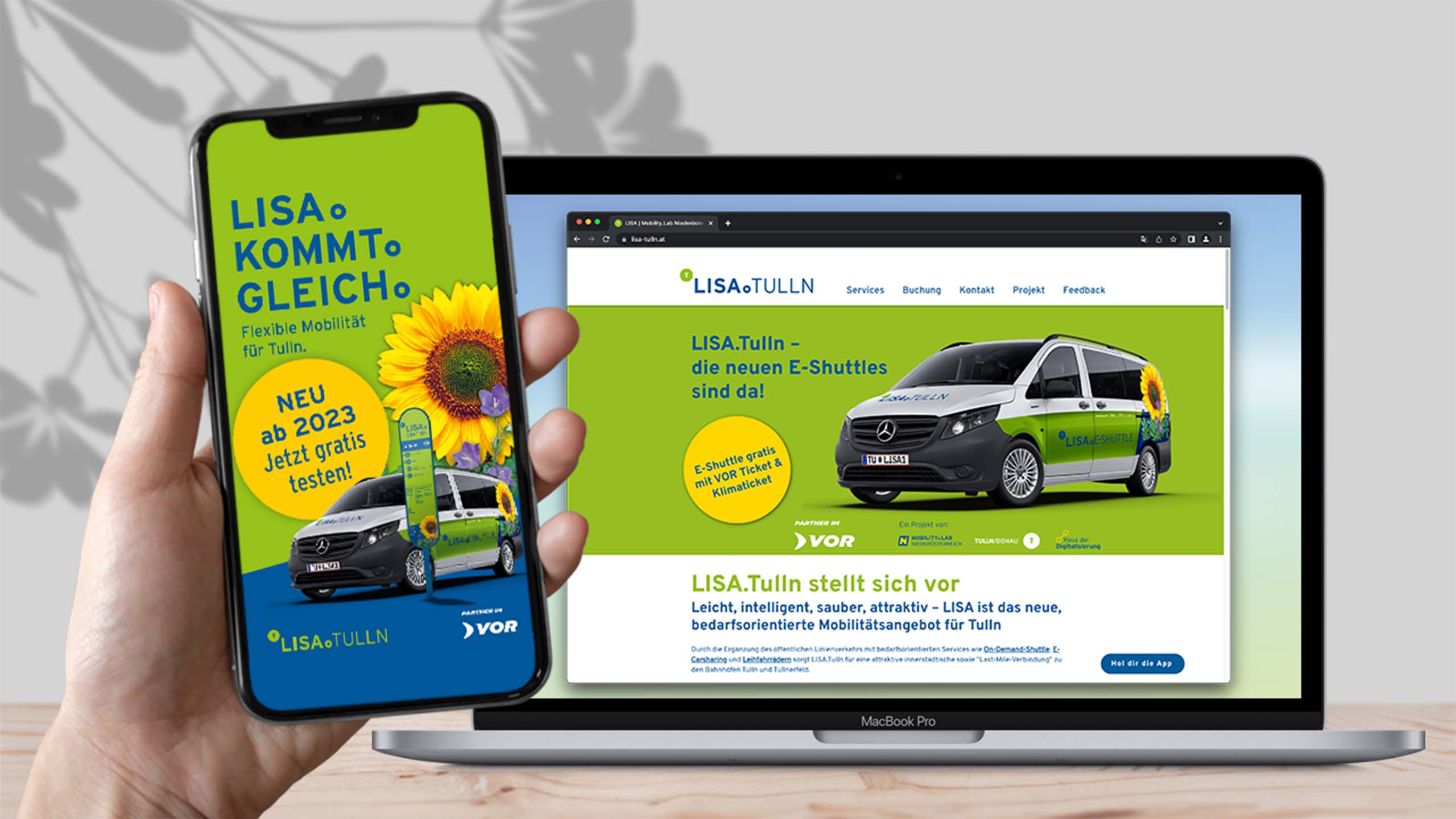 Smartphone- und Laptopansicht der LISA.Tulln Webseite und App – moderne digitale Buchung von E-Mobilitätsservices.