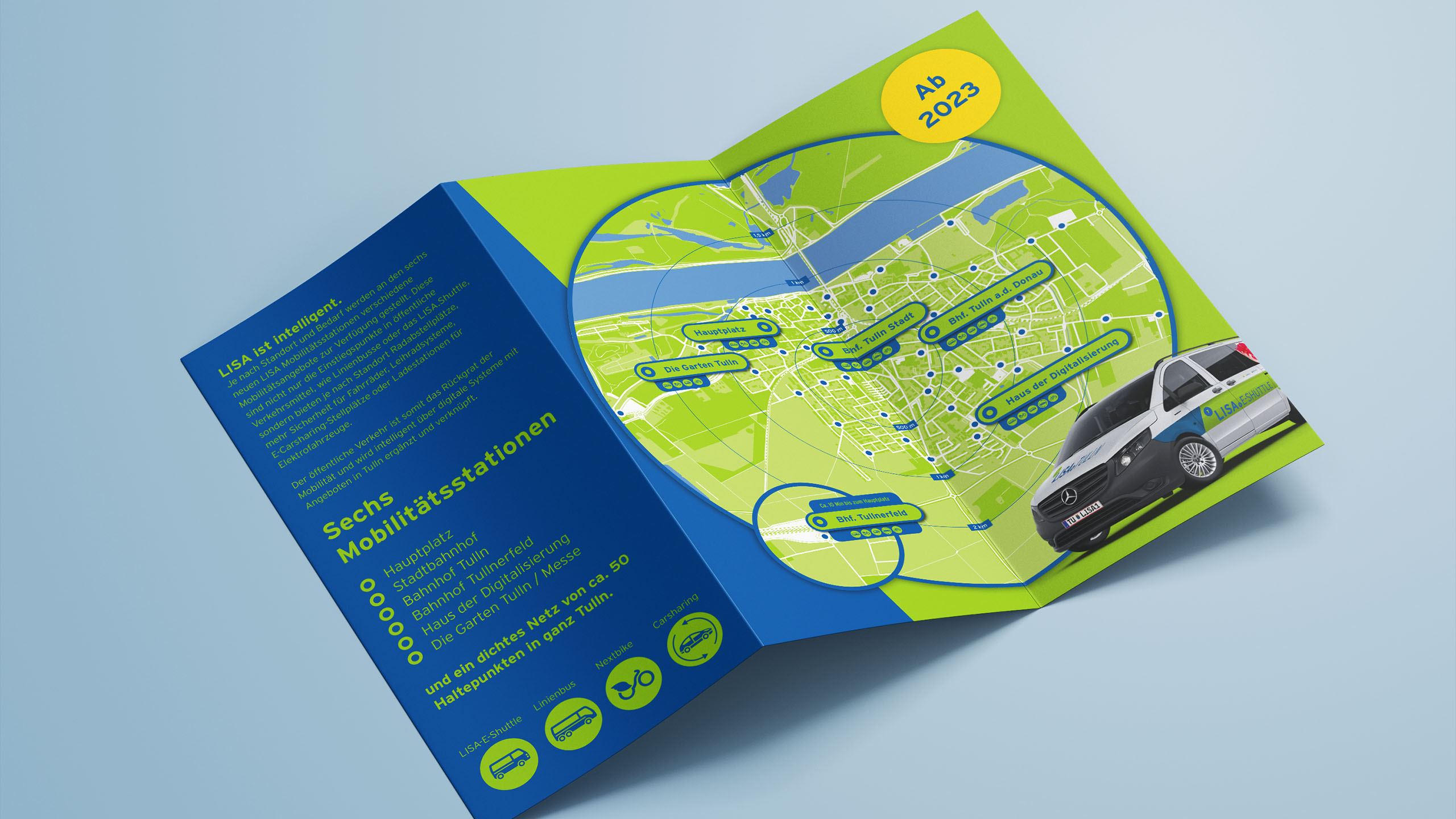 Faltkarte mit Mobilitätsstationen von LISA.Tulln und Stadtplan – Übersicht der Standorte für E-Shuttles, Carsharing und Fahrräder.