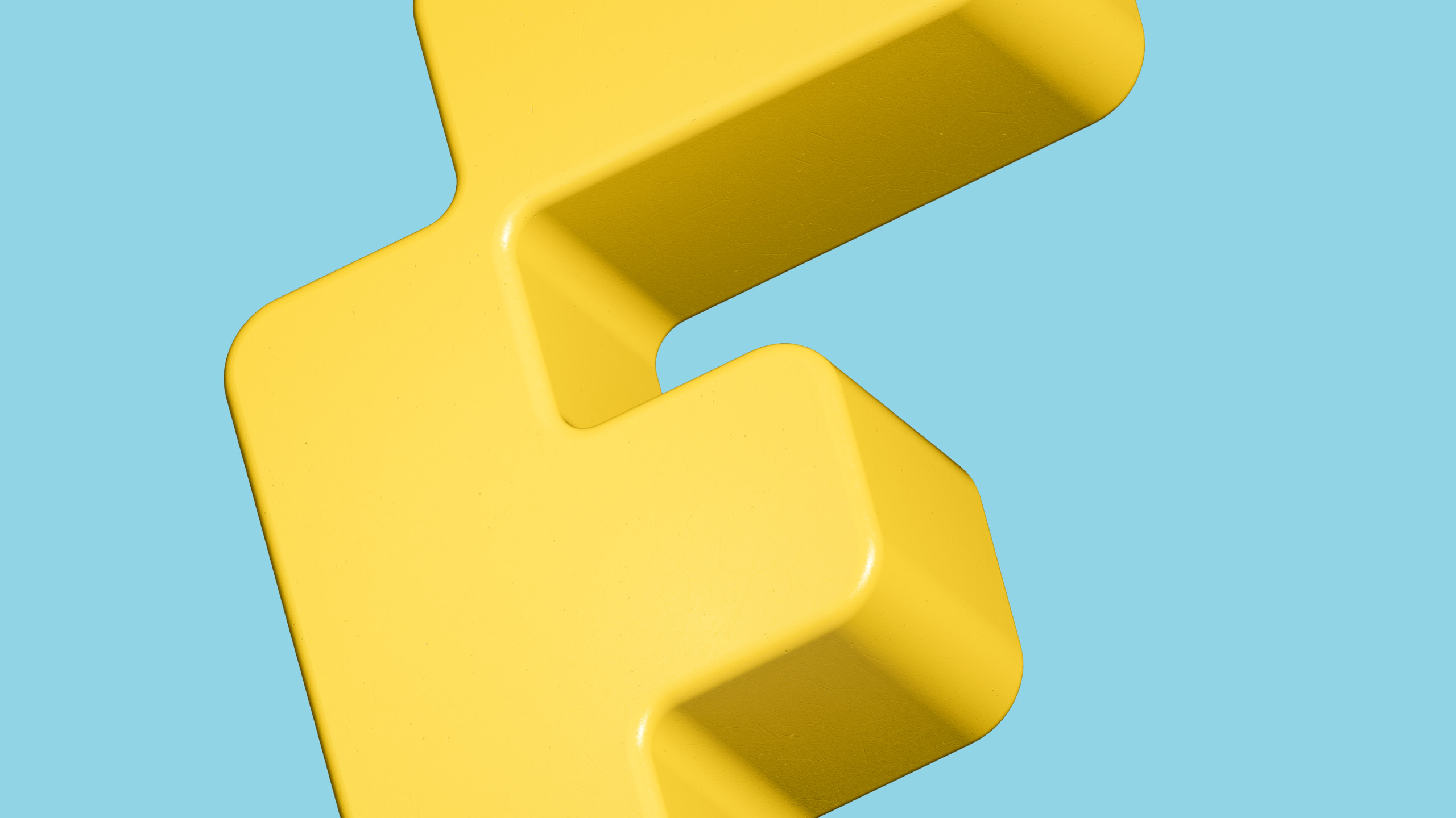 Detailansicht des gelben F-Keyvisuals auf hellblauem Hintergrund – Markenelement des Bibliotheken-Festivals Niederösterreich 2025.